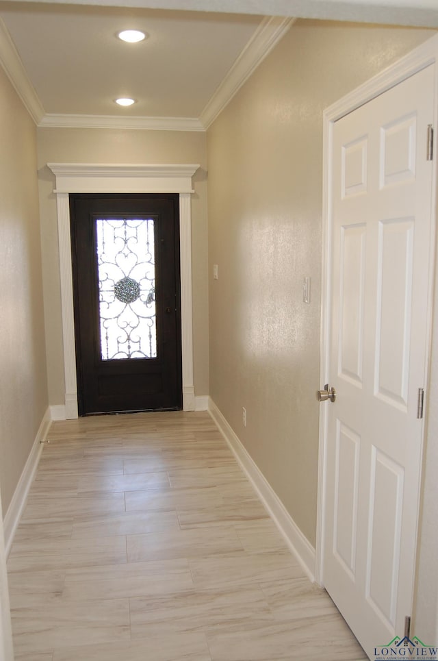 entryway with crown molding