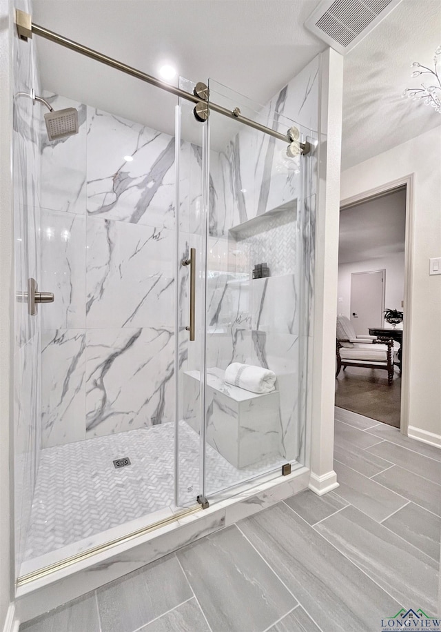 bathroom with walk in shower