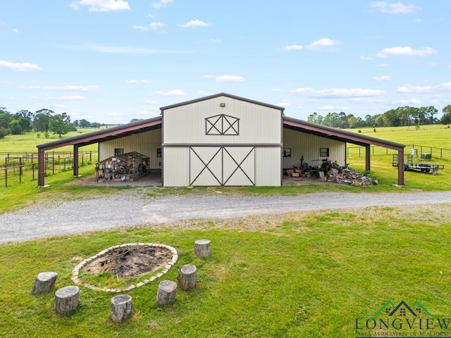 6056 Bobwhite Rd, Gilmer, TX 75645 - view of pole building with driveway