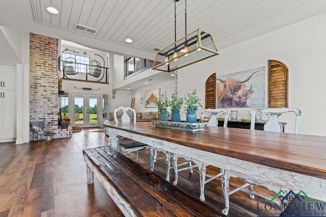 6056 Bobwhite Rd, Gilmer, TX 75645 - dining space featuring wood finished floors, french doors, a high ceiling, recessed lighting, and wooden ceiling