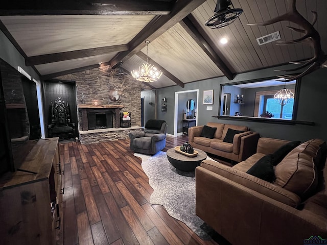 living room featuring a fireplace, hardwood / wood-style floors, lofted ceiling with beams, and a notable chandelier