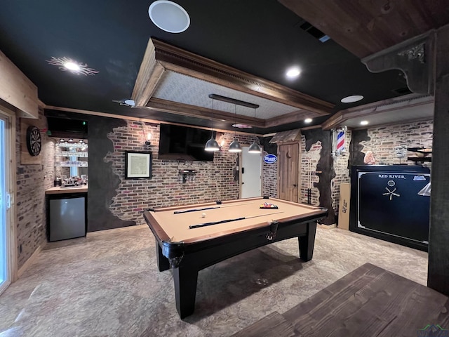 game room with brick wall and billiards