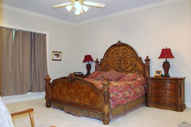 carpeted bedroom with ceiling fan and crown molding