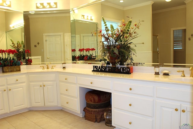 bathroom featuring tile patterned flooring, vanity, and ornamental molding