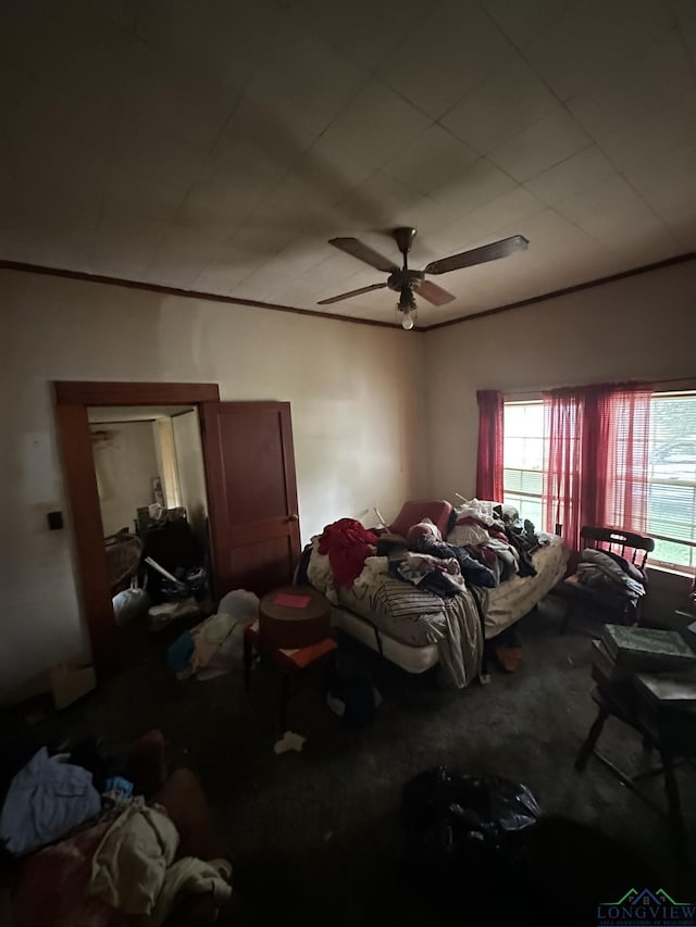 51 Conner St, Avinger, TX 75630 - carpeted bedroom with a ceiling fan