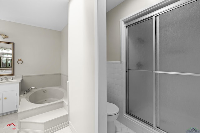 3408 Airline Rd, Longview, TX 75605 - bathroom with vanity, a shower stall, a jetted tub, and tile patterned flooring