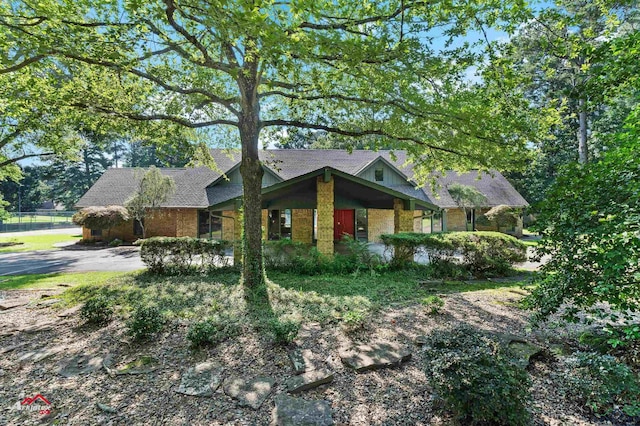 3408 Airline Rd, Longview, TX 75605 - view of front of property featuring roof with shingles and brick siding
