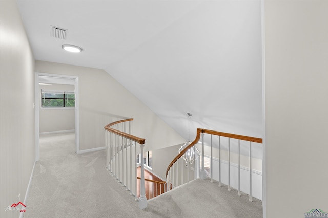 3408 Airline Rd, Longview, TX 75605 - stairway featuring carpet flooring and vaulted ceiling