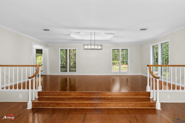 3408 Airline Rd, Longview, TX 75605 - staircase featuring wood finished floors and ornamental molding