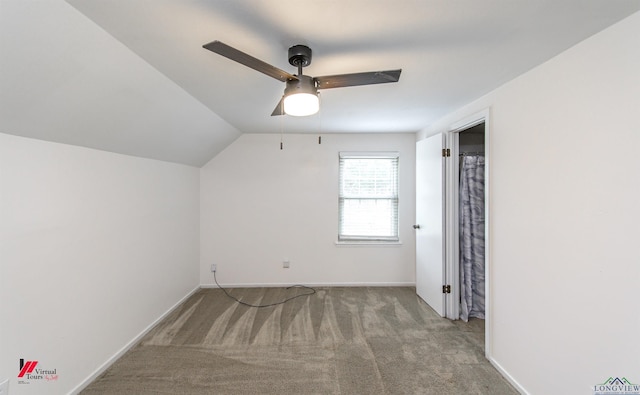 bonus room featuring light carpet, lofted ceiling, and ceiling fan