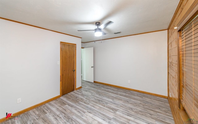 unfurnished bedroom with ceiling fan, light wood-type flooring, and crown molding