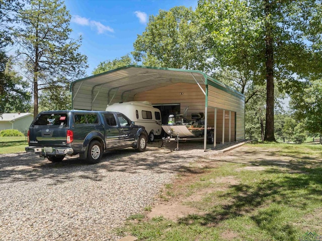 view of vehicle parking featuring a carport