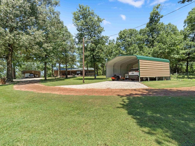 view of yard with a carport