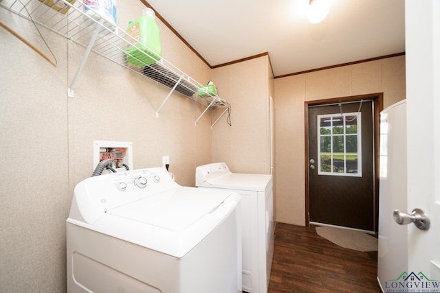 laundry room featuring independent washer and dryer, dark wood-type flooring, and ornamental molding