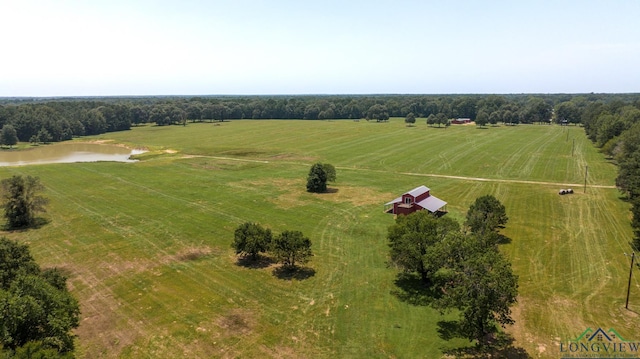 drone / aerial view featuring a rural view and a water view