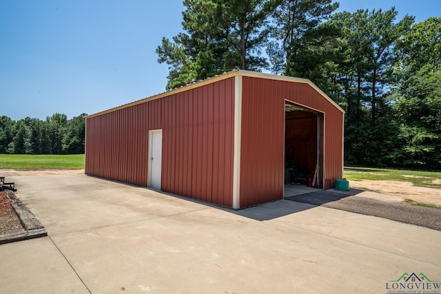 view of outbuilding with a garage