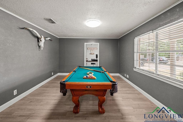 rec room with hardwood / wood-style floors, crown molding, billiards, and a textured ceiling