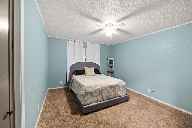 bedroom featuring ceiling fan, dark carpet, and a textured ceiling