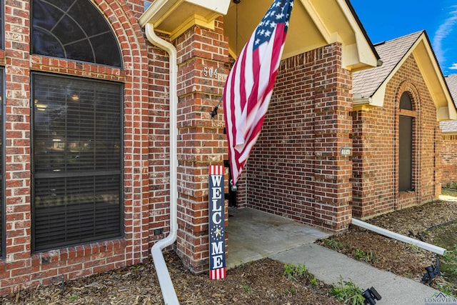 504 Lakewood Dr, Longview, TX 75604 - doorway to property with brick siding