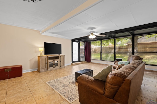 504 Lakewood Dr, Longview, TX 75604 - tiled living area with ceiling fan, baseboards, and beam ceiling