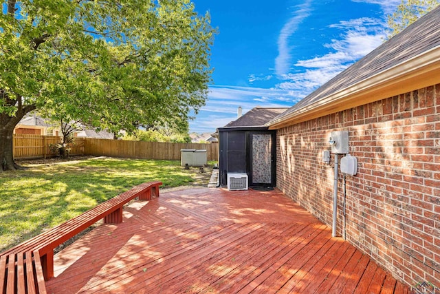 504 Lakewood Dr, Longview, TX 75604 - wooden deck featuring a yard, a fenced backyard, and ac unit
