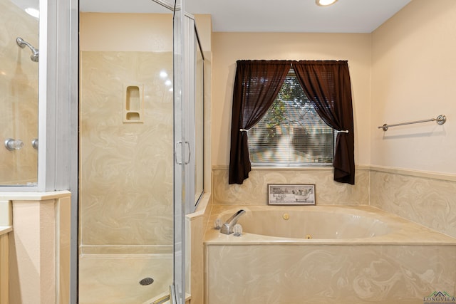 504 Lakewood Dr, Longview, TX 75604 - bathroom featuring a bath and a shower stall
