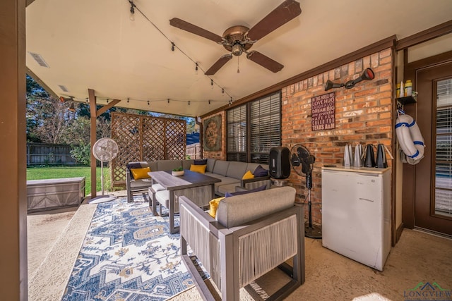 view of patio featuring ceiling fan and an outdoor hangout area