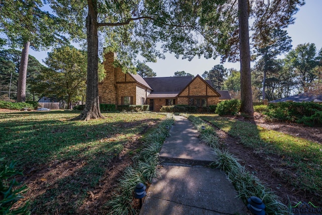 view of front of house with a front lawn