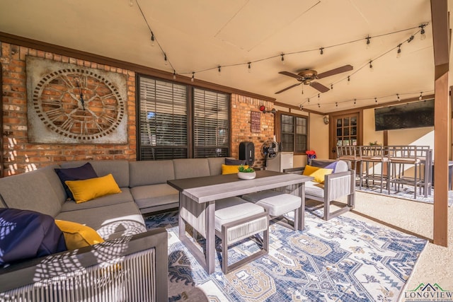 living room with ceiling fan