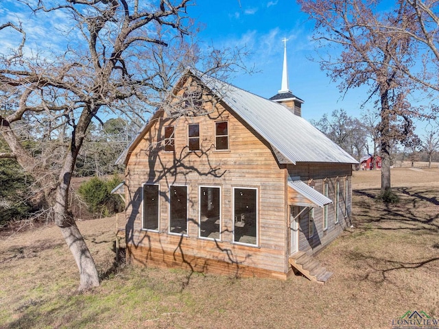 exterior space with a yard