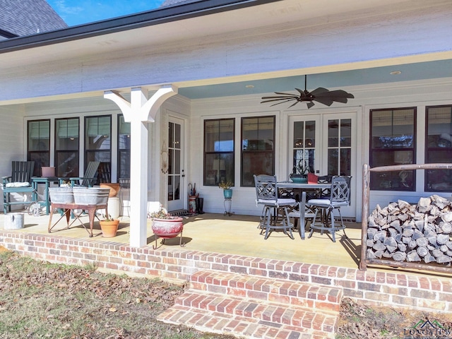 view of patio / terrace featuring ceiling fan