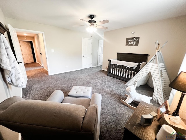 living room featuring ceiling fan and dark colored carpet