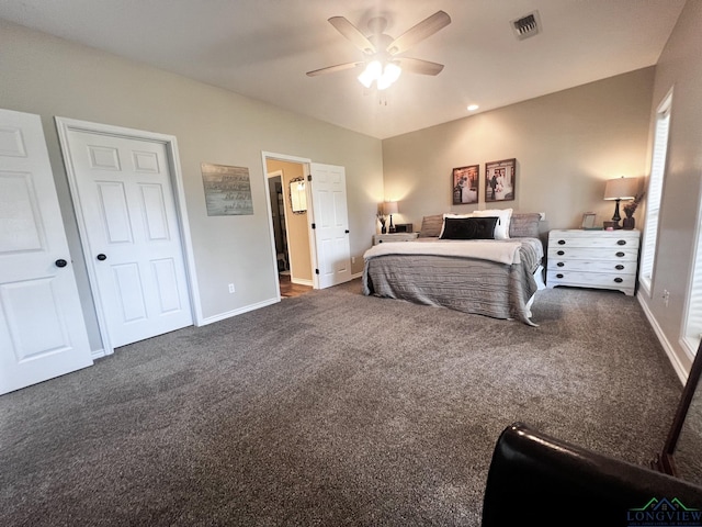 bedroom with dark carpet and ceiling fan