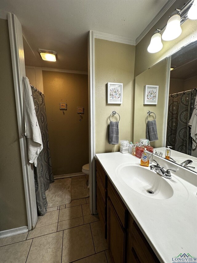 bedroom with a ceiling fan, wood finished floors, and ornamental molding