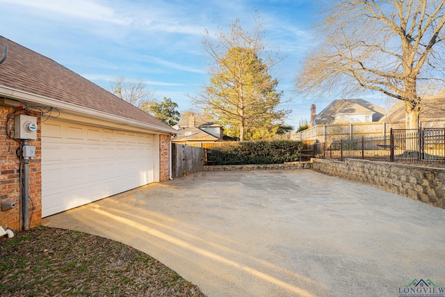 exterior space with a garage