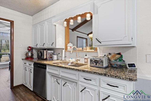 kitchen with dishwashing machine, dark wood-style flooring, a sink, and white cabinetry