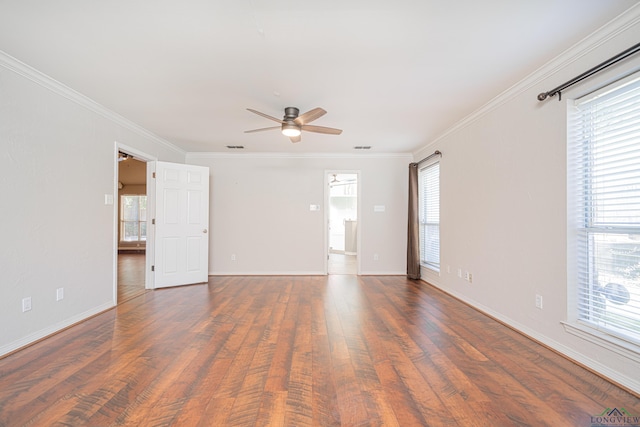 unfurnished room with dark hardwood / wood-style flooring, ceiling fan, and crown molding