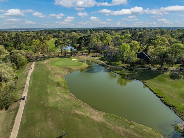 aerial view featuring a water view, a forest view, and view of golf course