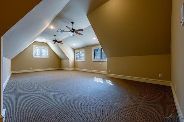 bonus room with carpet, visible vents, baseboards, and vaulted ceiling