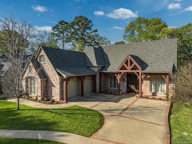 view of front of house with brick siding, roof with shingles, an attached garage, and concrete driveway