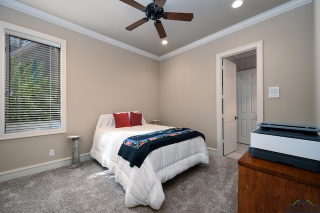 carpeted bedroom with recessed lighting, baseboards, ornamental molding, and a ceiling fan