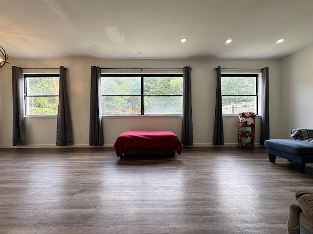 1612 Oden St, Longview, TX 75602 - bedroom featuring multiple windows, wood finished floors, recessed lighting, and baseboards