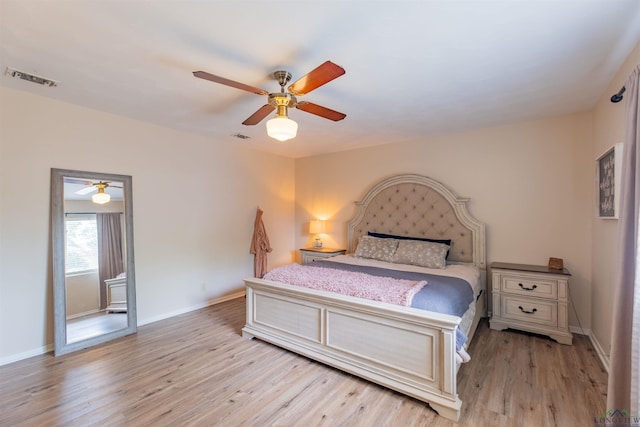 1900 Franklin Dr, Longview, TX 75601 - bedroom featuring light wood-style flooring, baseboards, and ceiling fan