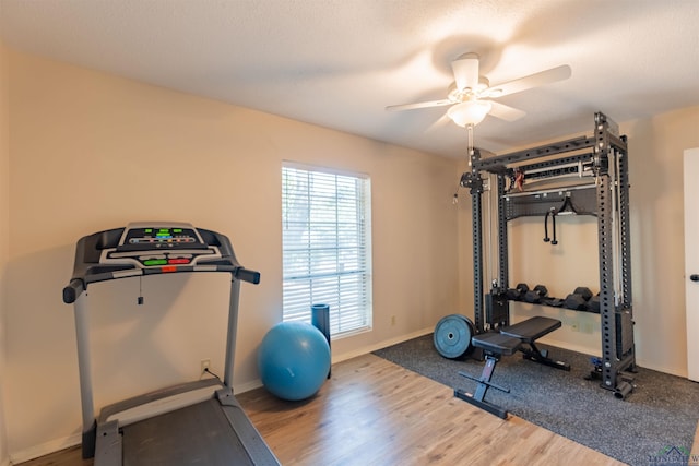 1900 Franklin Dr, Longview, TX 75601 - workout area with wood finished floors, ceiling fan, and baseboards