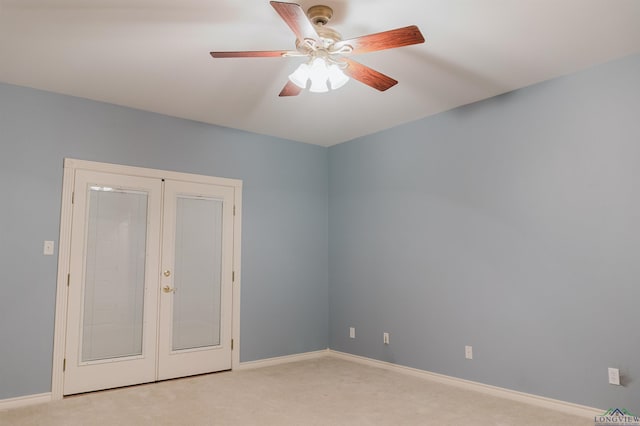 unfurnished bedroom with french doors, light colored carpet, and ceiling fan