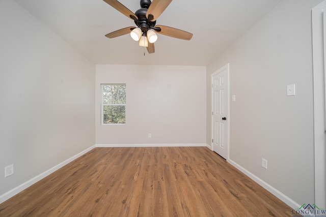 unfurnished room featuring wood-type flooring and ceiling fan