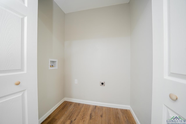 laundry room with wood-type flooring, electric dryer hookup, and washer hookup