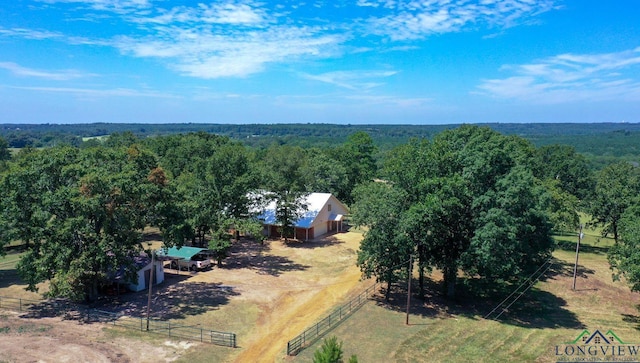 birds eye view of property with a rural view