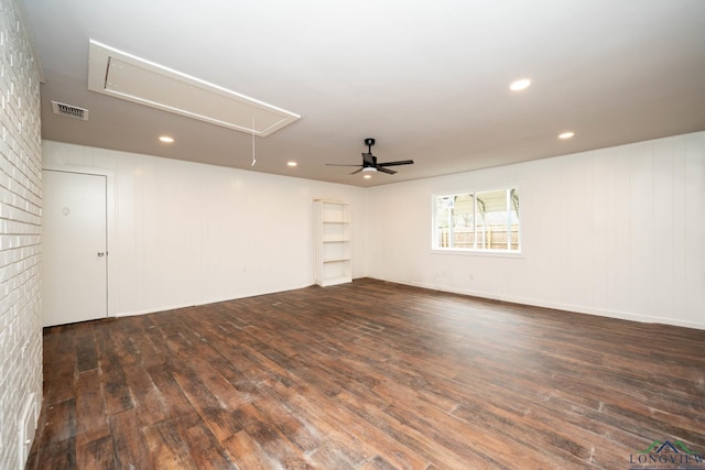 empty room with recessed lighting, visible vents, attic access, dark wood-type flooring, and a ceiling fan