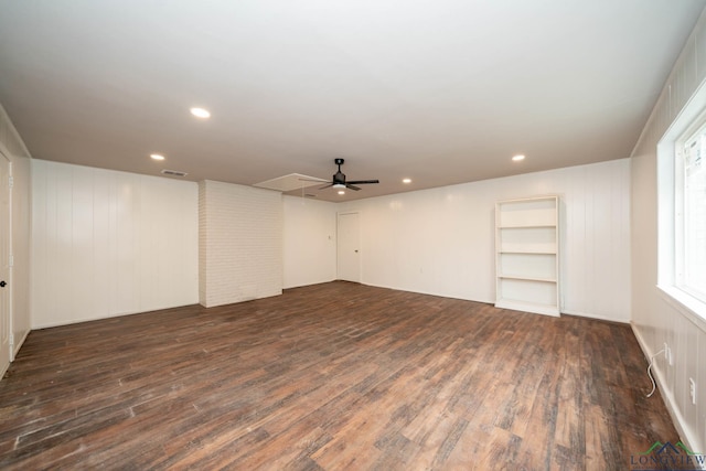 empty room featuring a ceiling fan, visible vents, dark wood-style flooring, and recessed lighting